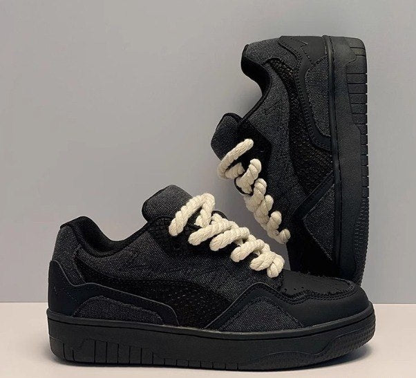 Black Low-Top Sneakers With White Rope Laces