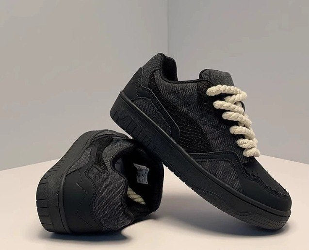 Black Low-Top Sneakers With White Rope Laces